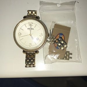 Gold fossil watch